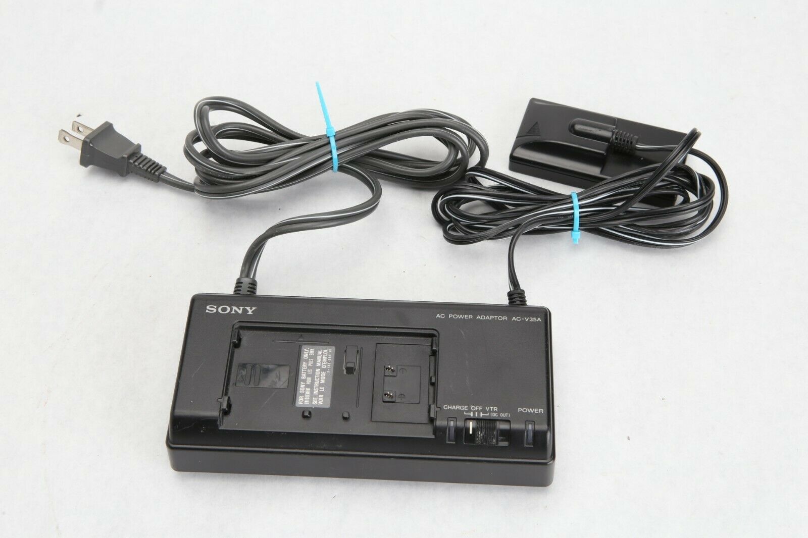 Sony AC-V35A AC Power Adaptor Battery Charger 110-240V 20W 7.5V 1.6A 10V 1.3A Good working condition. Shows signs of ha Sony AC-V35A AC Power Adaptor Battery Charger 110-240V 20W 7.5V 1.6A 10V 1.3A Good working condition. Shows signs of ha
